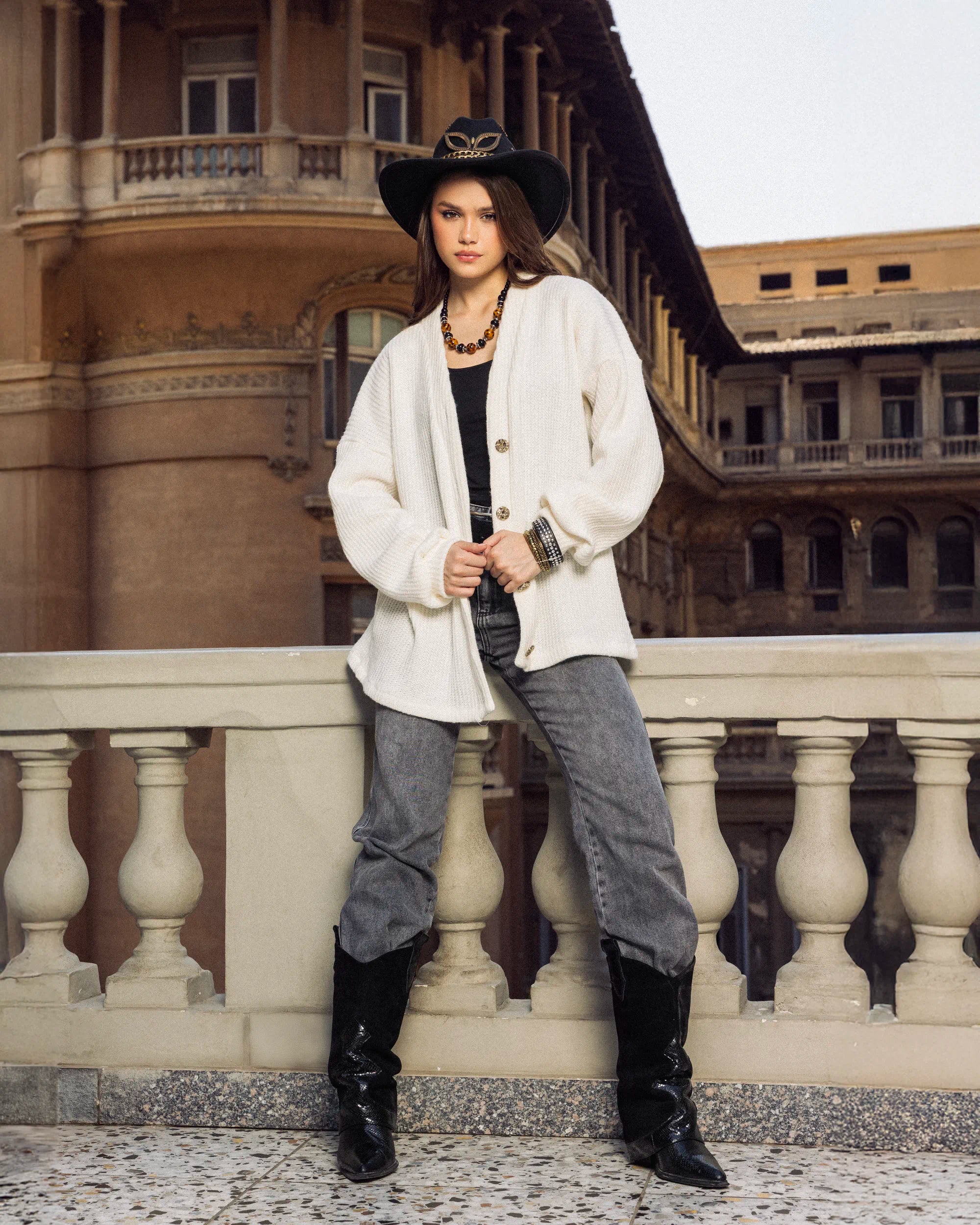 “Full-body view of the mustard Warmth  showing its soft knit drape and relaxed winter styling.”