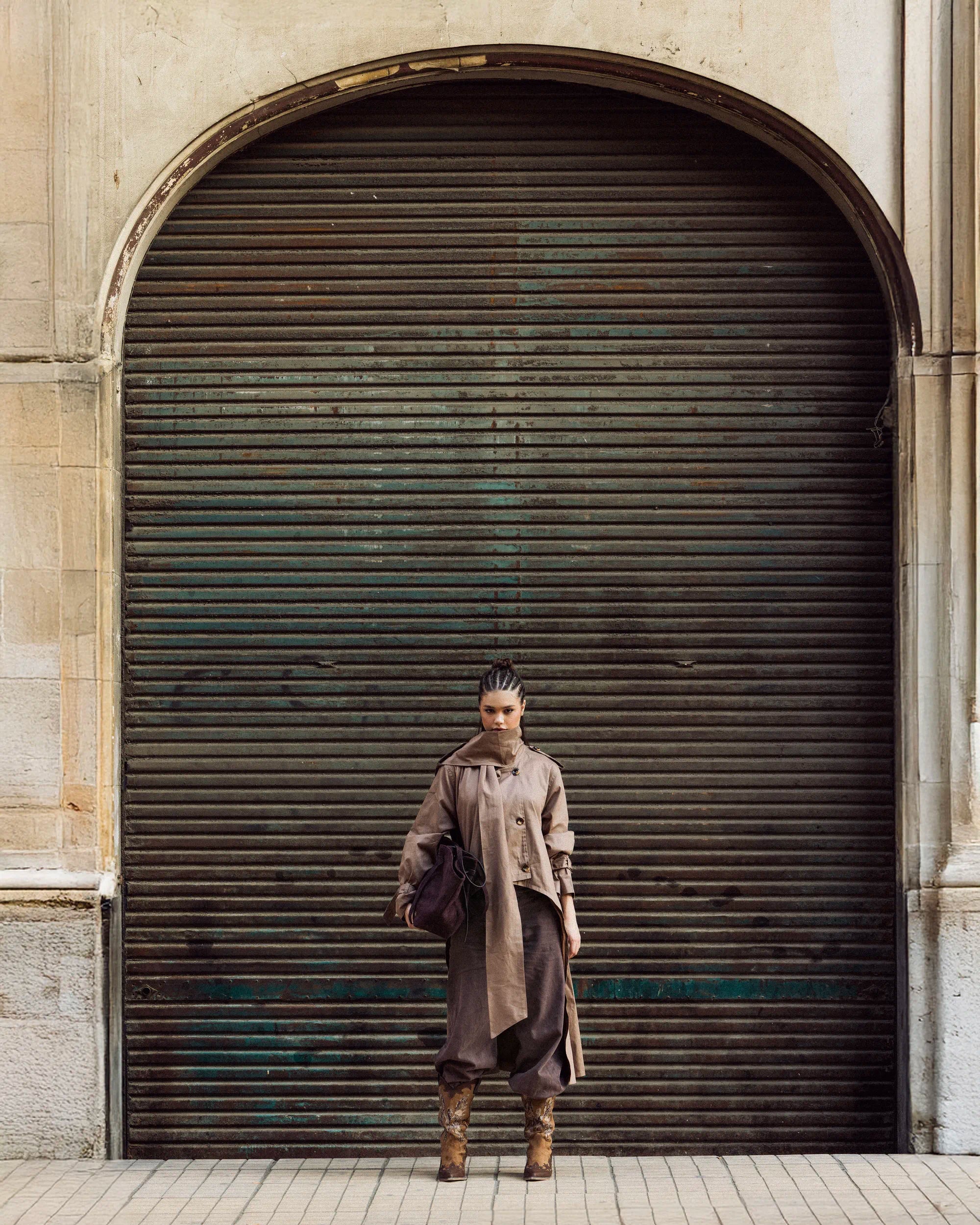 “Full-body view of the beige A-Line Coat highlighting its polished structured look and subtle A-line flare.”
