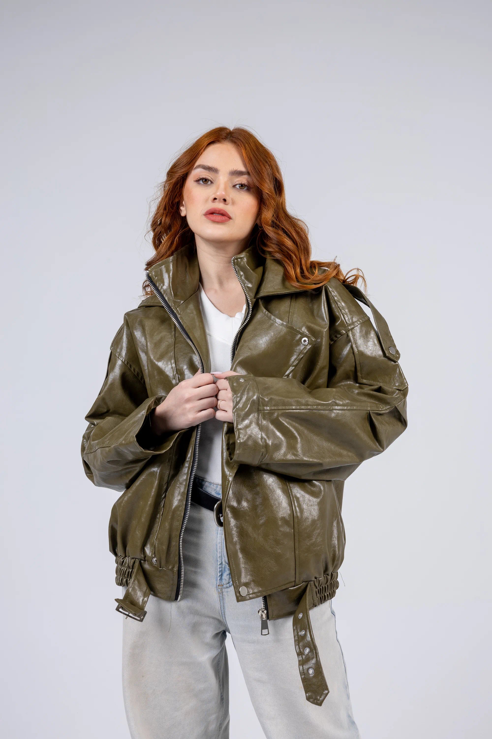 Woman wearing a green jacket on a white background