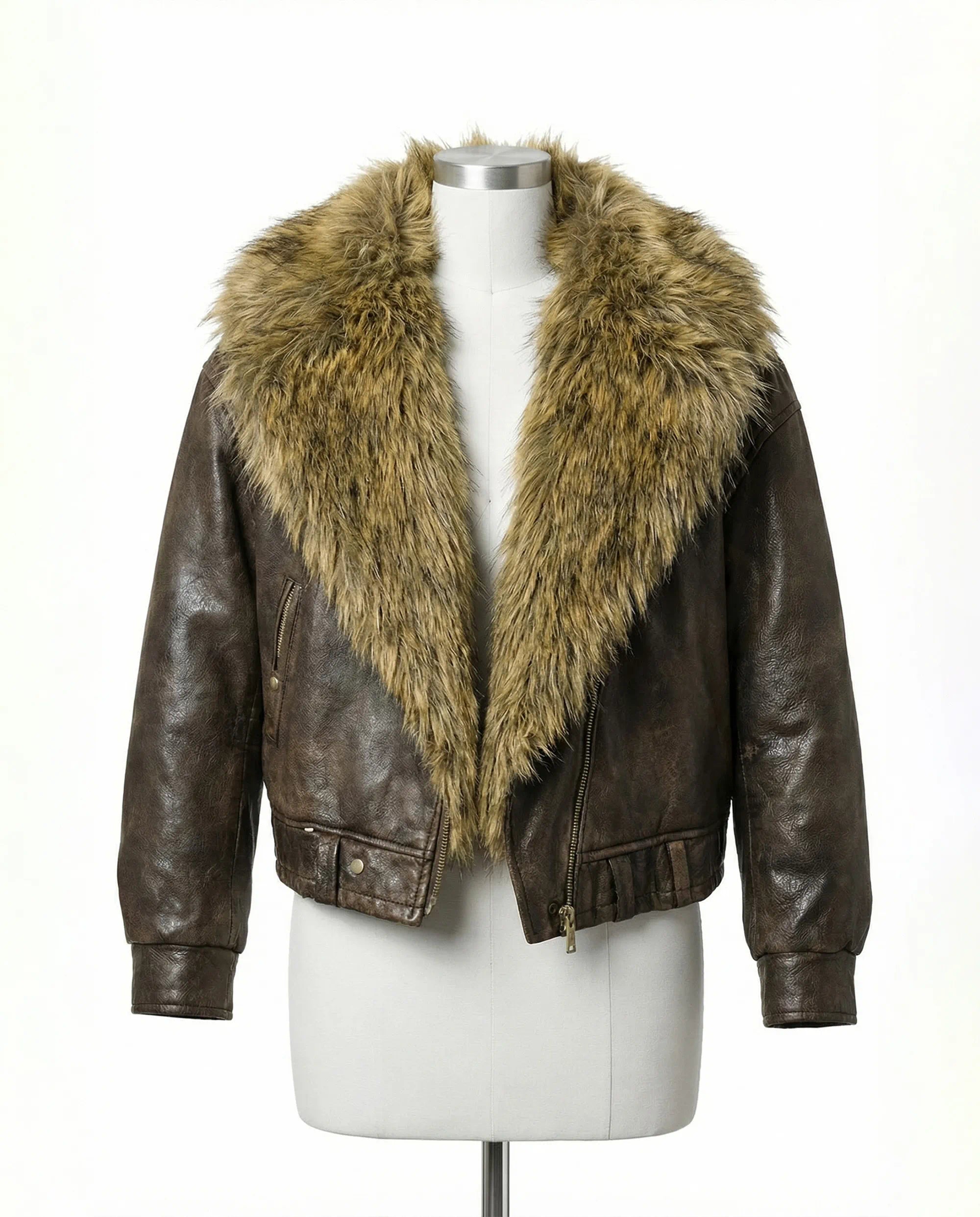 Brown leather jacket with fur collar on a mannequin against a white background